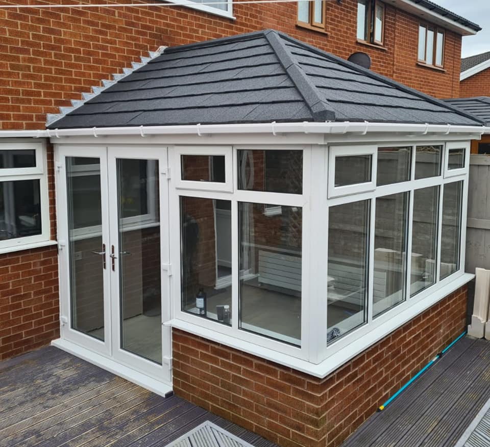 Conservatory roof replacement team working on a Liverpool home